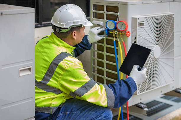 Professional Heat Pump Repair technician working in Mansfield, TX